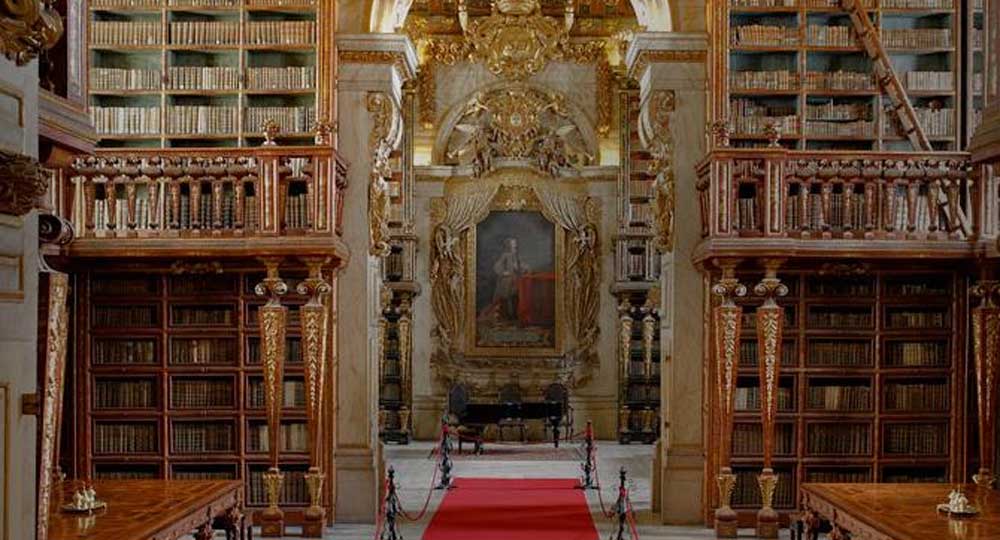 La magia dell’antica biblioteca barocca di Coimbra – Foto