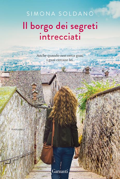 Copertina del libro Il borgo dei segreti intrecciati di Simona Soldano